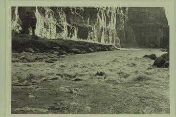 The "Bootoo" entering the head of Lava Falls. Left to right: Marston, Masland. About 5 PM