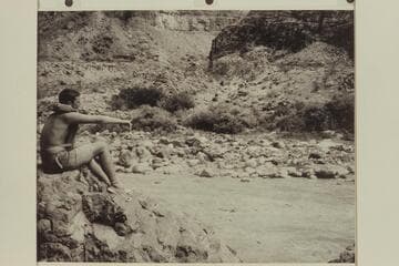 Vulcan Rapid. Buzz Belknap is sitting on the rock where Guy Forcier saw 1950, June 19