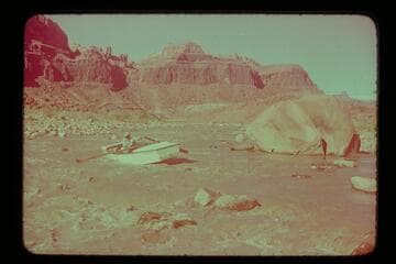 Norm Nevills hung up in Piute Rapid. MH gauge: May 1: 1190 cfs. May 2: 1120 cfs. May 3: 1080 cfs