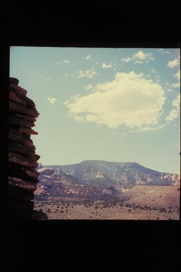 Across Trail Canyon to Navajo Mountain, ruin on left