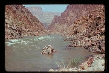 Down at 232 Mile Rapid at Mile 232 1/2 Requiem Rapid.  Estimated flow:  28,000 cfs