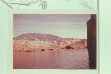 Down Lake Powell to the mouths of 71.5 and 71.3 from about Mile 71.6. Navajo Mountain; Rainbow Butte; Sid Whiskers Butte