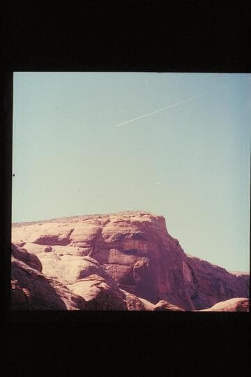 Ice trail of jet above Bridge Canyon