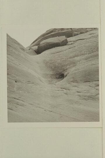 Small drainage into southwest fork of 73.6 just above drop-off and below the trail from southwest. At center is a pot-hole with water