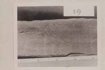 Scratches on rock slab which was taken from the Fort at the mouth of White Canyon. It appears to say "Julie"