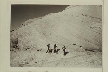 Christy and Tom walk Archeyes across the ledge as the walk out of Anasazi Canyon is ended near the Little Gray Mesa