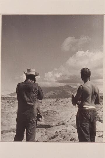 Bill Belknap and Jorgen Visbak photograph Navajo Mountain from the edge of the mesa to the north of Arch in the Sky