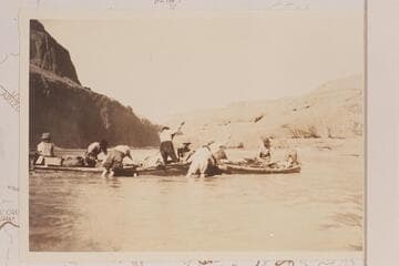 Pushing off a sand bar above Wa-weap. LaRue junket from Hall Creek to Lees Ferry