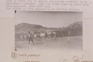 Tents, crew, Fort at Lees Ferry. The figure at left appears to be Charles Spencer