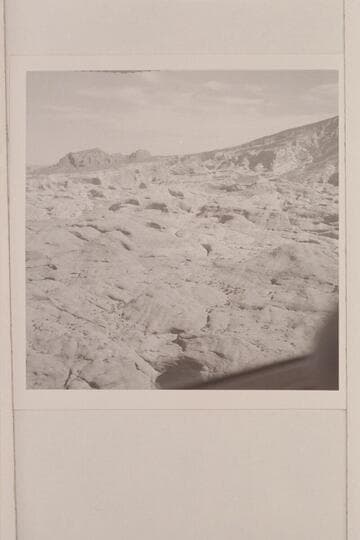 Between Bridge Canyon and 6069. Navajo Mountain at right