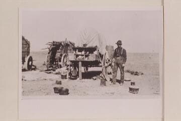 Cook wagon on road to Lees Ferry from Flagstaff. With the outfit carrying mining supplies to the Spencer placer