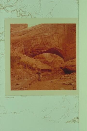 Herbert E. Gregory Natural Bridge. Soda Gulch, Escalante River, upstream view. Thompson in view