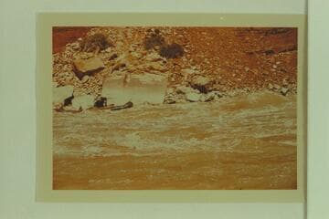 No. 1 pontoon of the Don Hatch party in Soap Creek Rapid. Mary Dorsey riding as passenger. Bruce and Clarke Lium as boatmen