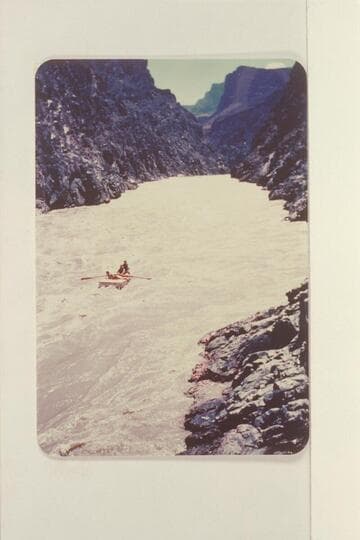 A. K. Reynolds running Sockdologer Rapid.  The photographer is on the left bank near the lower end of the rapid.  Ellen Reynolds is riding the stern with Cappy Rowe in the bow.  Bright Angel gauge:  15,000 cfs