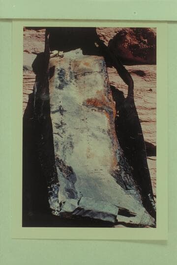 Burned-out metal boat at Hole in the Rock