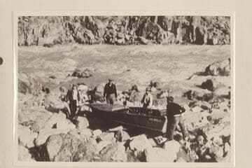 Portage of Aleson's boat, the "Up Lake." Mile 233 3/4, 234 Mile Rapid. Swenson; Brown; Aleson; Moore