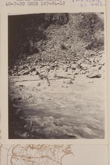 Hugh Cutler at the oars of a Nevills sadiron. This is probably in North Wash Riffle. Probably 21 Mile Rapid