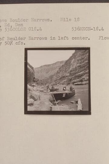 18-ft. boats about Boulder Narrows. Mile 18. Claude, Bill, Ed, Don. The boulder of Boulder Narrows in left center. Flow is approximately 50,000 cfs