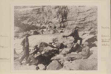 Stanton and crew at noon rest in Marble Canyon.  Photo probably by [William Hiram] Edwards