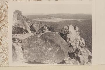 The Dunn 1869 inscription on Mt. Dellenbaugh.  Inscription; boulder; background