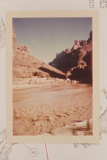 Up Marble Canyon from the mouth of the Little Colorado. The flow at the bottom of the picture is the flood out of the Little Colorado which runs up Marble Canyon to meet the Colorado