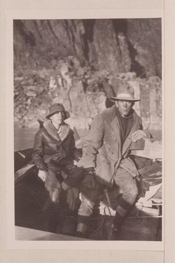 Bessie and Glen Hyde in their scow; above Monument Creek Rapid