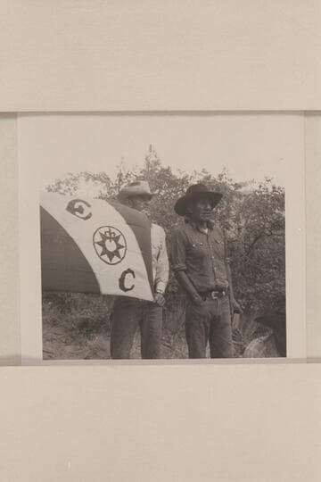 Tom Daly holds Masland's flag.  Tobe Owl - Nasja Begay is beyond Tom; Middle fork of 73