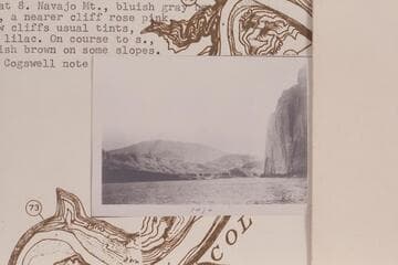 Down Glen Canyon from Mile 71.9.  Whisky Flat is center left.  Navajo Mountains in the distance