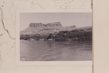 Butte on right bank about 1 1/2 miles below Hite Ferry