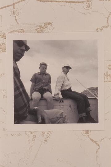 The bow of the "Bert Loper" with crew as decoration. Gay Stavely at left and Jody Baker