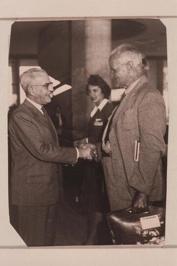 Lewis R. Freeman (right).  Probably during the South American flights in 1933 and showing his age.  He was born 1878, Oct. 04.  [on photo reverse:  Panair stamp]