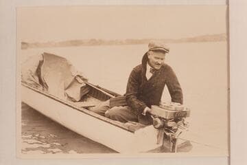 Lewis R. Freeman with his Elto motor on the Ohio River