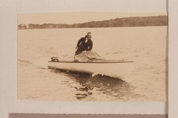 Lewis R. Freeman and his Elto powered boat on the Ohio River