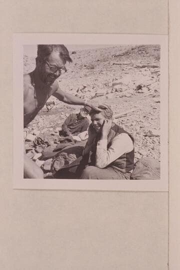 Frank LaRue makes up Buzz Belknap as Andy Hall.  Gods Pocket.  Ballard Atherton looks on