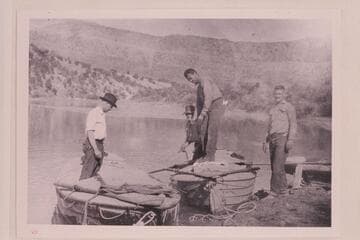 Blake, Curely, Hale, West? Page? with the boats used on run on upper Green River. The boats were those used by the survey in 1922