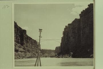 The highway bridge across Marble Gorge. Lees Ferry 57,900 cfs. The tripod was used for a small motion picture camera