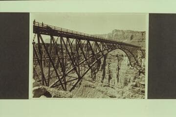Navajo Bridge.  Mile 4-5, Marble Canyon.  The construction started August of 1927 and was completed January 1929.  Dedication was 1929, June 14-15.  Photo from Freeman collection