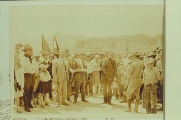 Cutting ribbon at dedication of Navajo Bridge.  Freeman photo [Governors of New Mexico, Utah, Nevada, and Arizona]