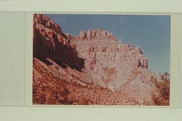 Apache Point from the Esplanade. The trail is on the slide in center