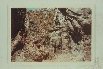 Left bank of Hakatai Canyon a few hundred feet from mouth showing built sections of trail leading up left wall of canyon. It certainly looked as if it went to bar just above mouth of canyon where cable used to be