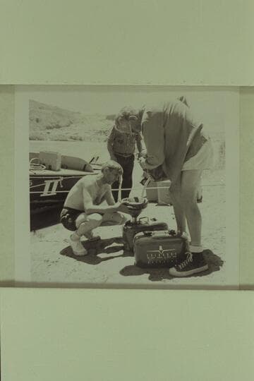Guy Forcier and John Doerr fueling supply tanks. Lees Ferry