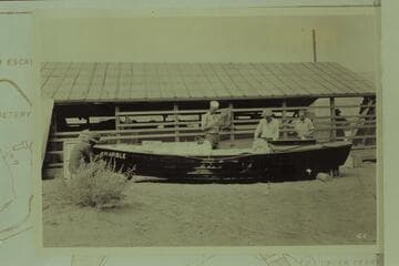 Work on the "Marble" to get her into condition for the transit of the Grand Canyon.  Boathouse at Lees Ferry, left bank