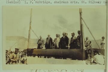 Speakers stand at Bridge dedication. From Freeman collection
