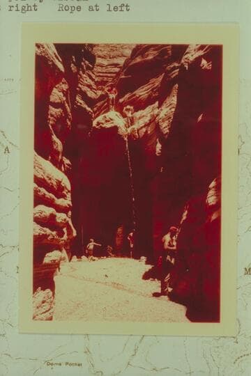 40 ft. tall 1/4 mile from mouth of Tuckup Canyon.  Water stream at right; rope at left