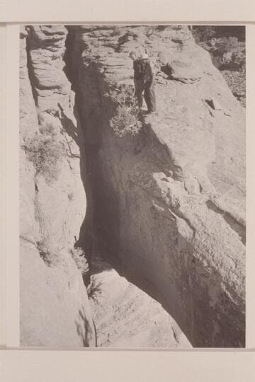 Natural bridge from above. Ballard Atherton and Jorgen Visbak stand on top. Masland is proposing the name, "Whitehat Bridge."