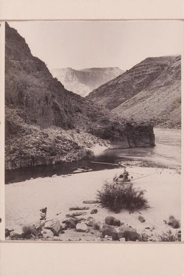 Boat, helicopter and camp at Tapeats Creek. Belknap shifts his cameras