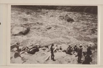 Lava Cliff Rapids at end of portage. L to R: Koms, Moore, Blake, Lint, Burchard, Birdseye and Stabler