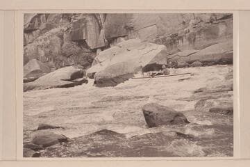 A. K. Reynolds running the lower end of Triplet Rapid.  Low water