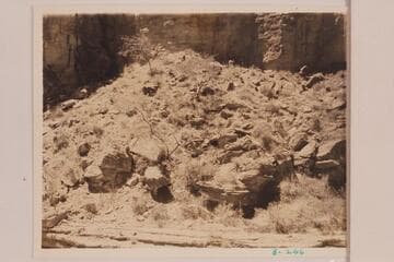 Side of Canyon opposite 3-245 which shows "Noon halt in the shade."  At 164 Mile Canyon