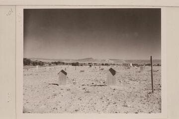 Graves of Galloway and his wife at Vernal cemetery.  Split Mountain in distance